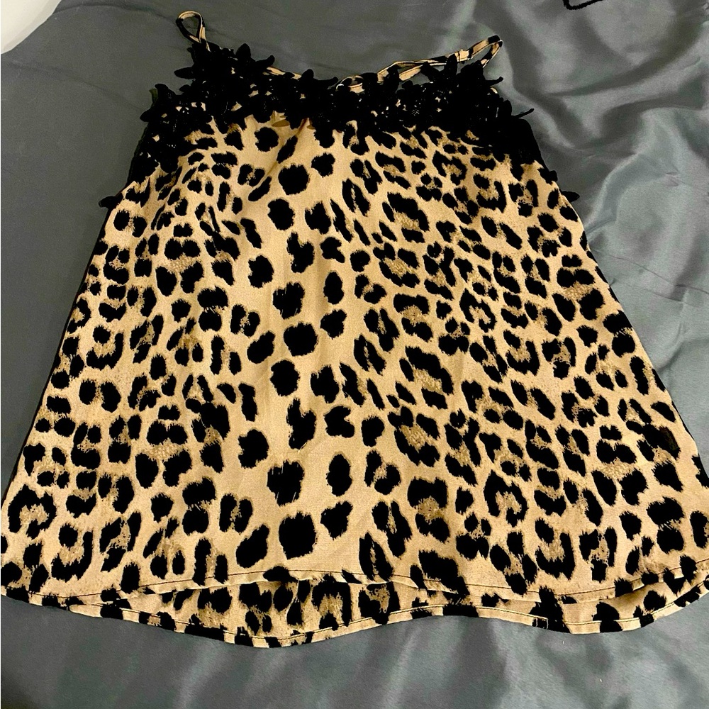 Leopard tank, cute design at the top.